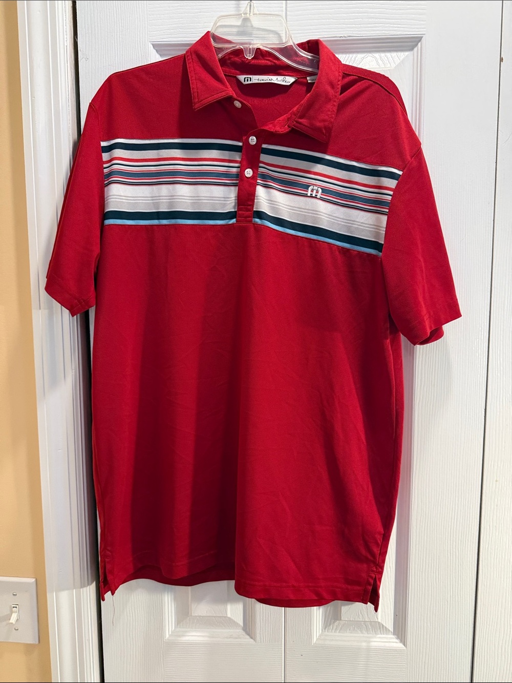Travis Mathew Red Polo with White and Teal Stripe Chest